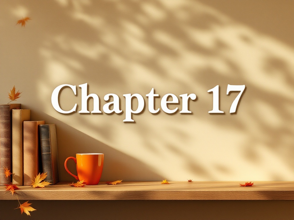 This is a desk under warm light with some books and an orange cup and saucer on the far left side with the words 'Chapter 17' in the center